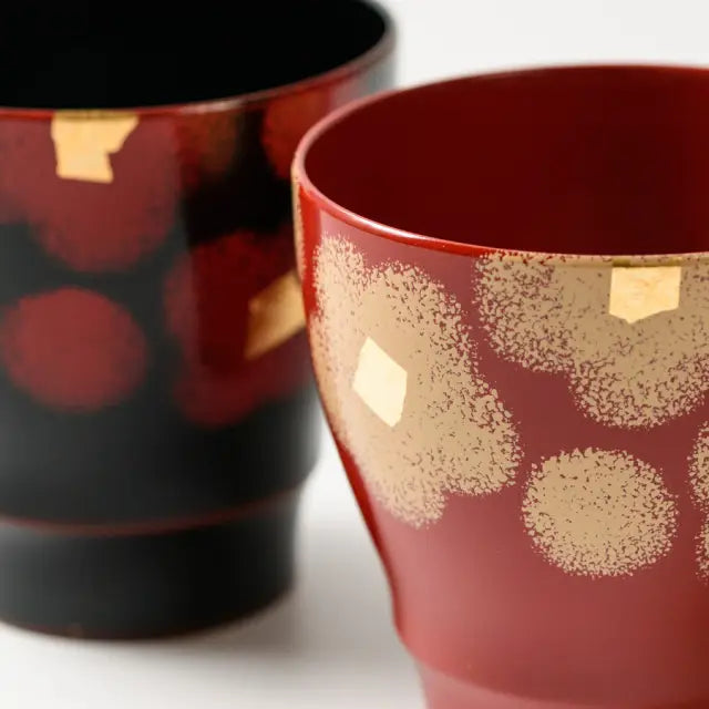 Pair of cups, red and white, lacquered
