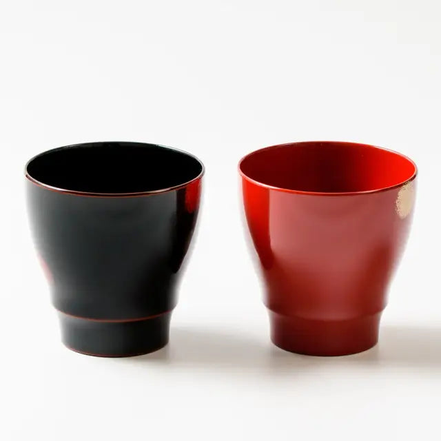 Pair of cups, red and white, lacquered