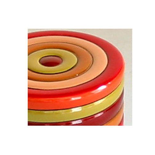 Small wooden tea caddy with spinning top design, lacquered