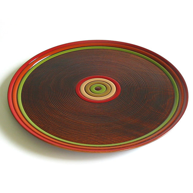 Round tray with spinning top design