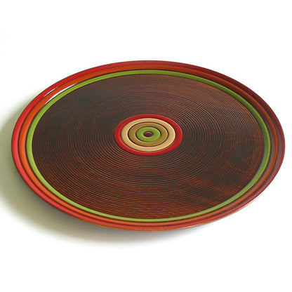 Round tray with spinning top design